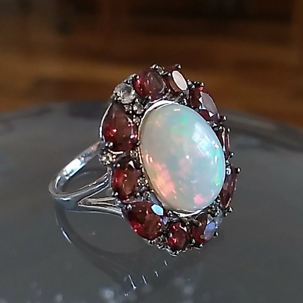 Paul Deasy Never worn Garnet and Eithopian Opal Ring